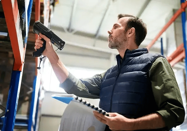caucasian-man-using-bar-code-reader-in-a-warehouse-2024-11-29-20-40-33-utc (1)